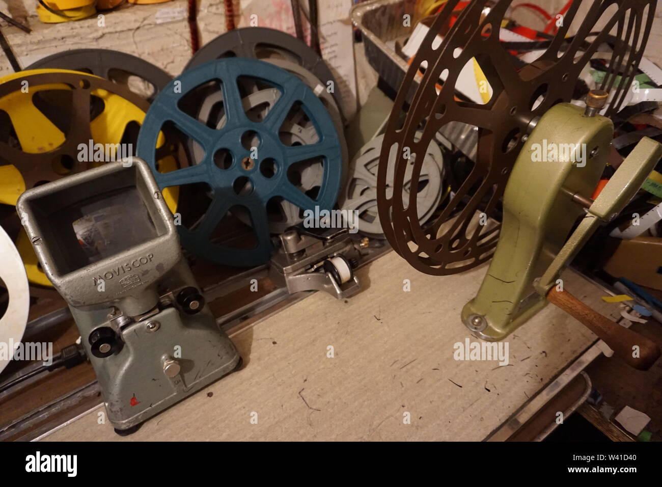 Basement studio of underground, experimental filmmaker Craig Baldwin. Mission District, San Francisco, California.  Moviscop viewer on editing table. Stock Photo