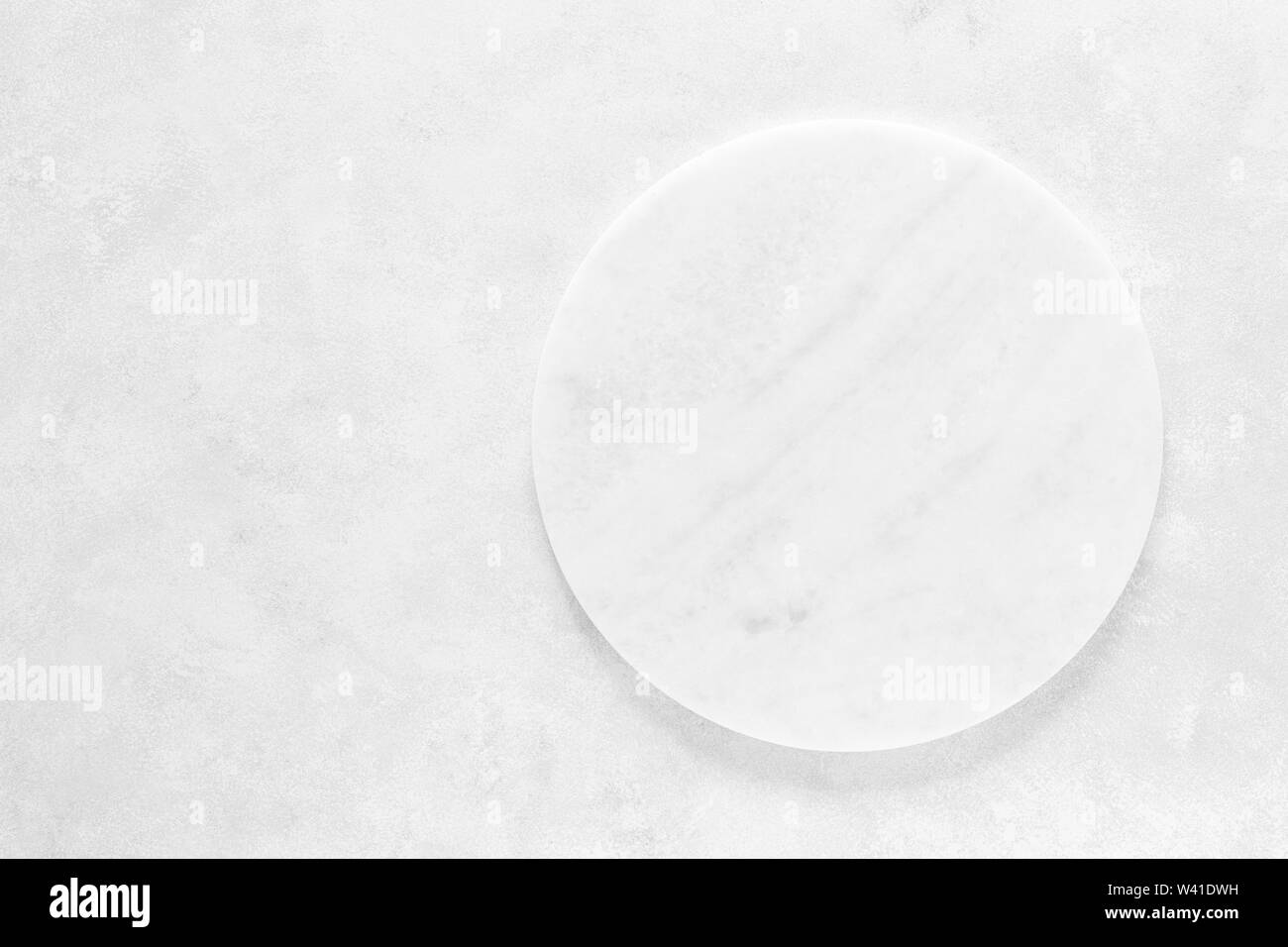 Empty stone board on white background with space for text, culinary background, top view Stock Photo