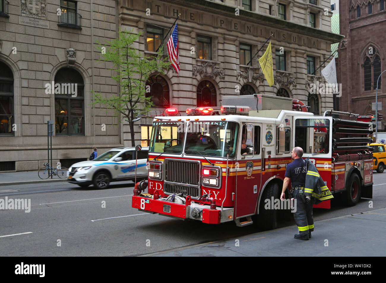 Fire truck speeding up in downtown Chicago. Stock Photo