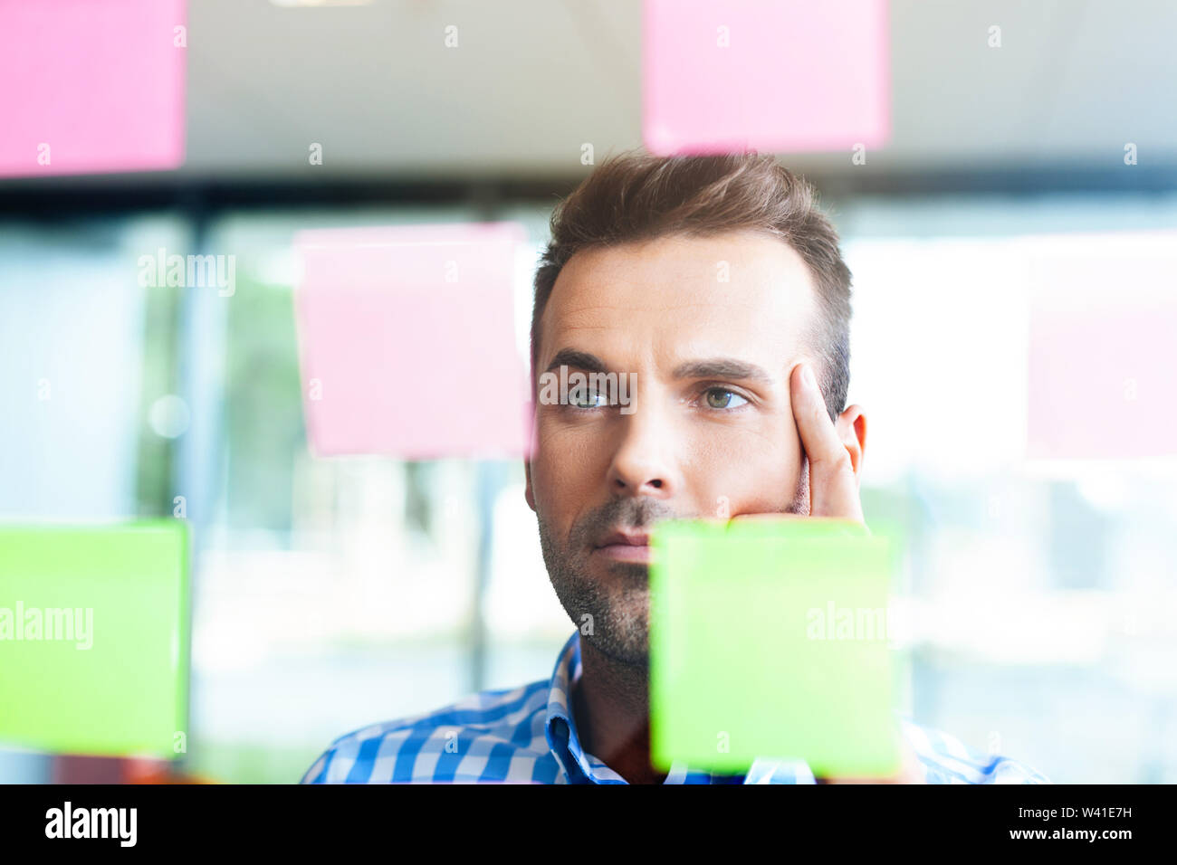 thoughtful man working in the office Stock Photo
