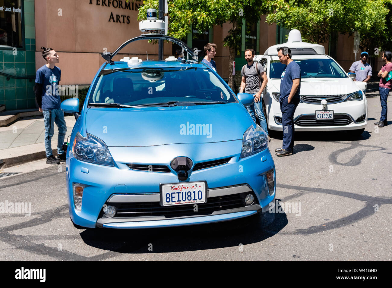 July 16, 2019 Mountain View / CA / USA - Nuro self driving vehicle on display at Technology Showcase; Google Waymo self driving car visible in the bac Stock Photo