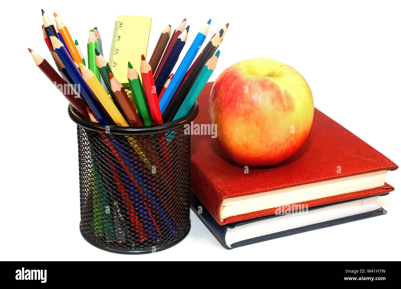 Color pencils and books isolated on white Stock Photo