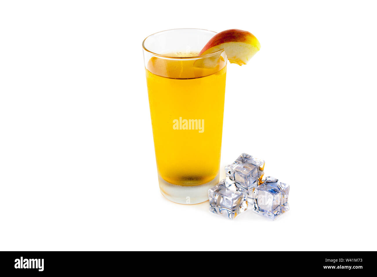 Apples apple juice and ice cubes on a white background Stock Photo