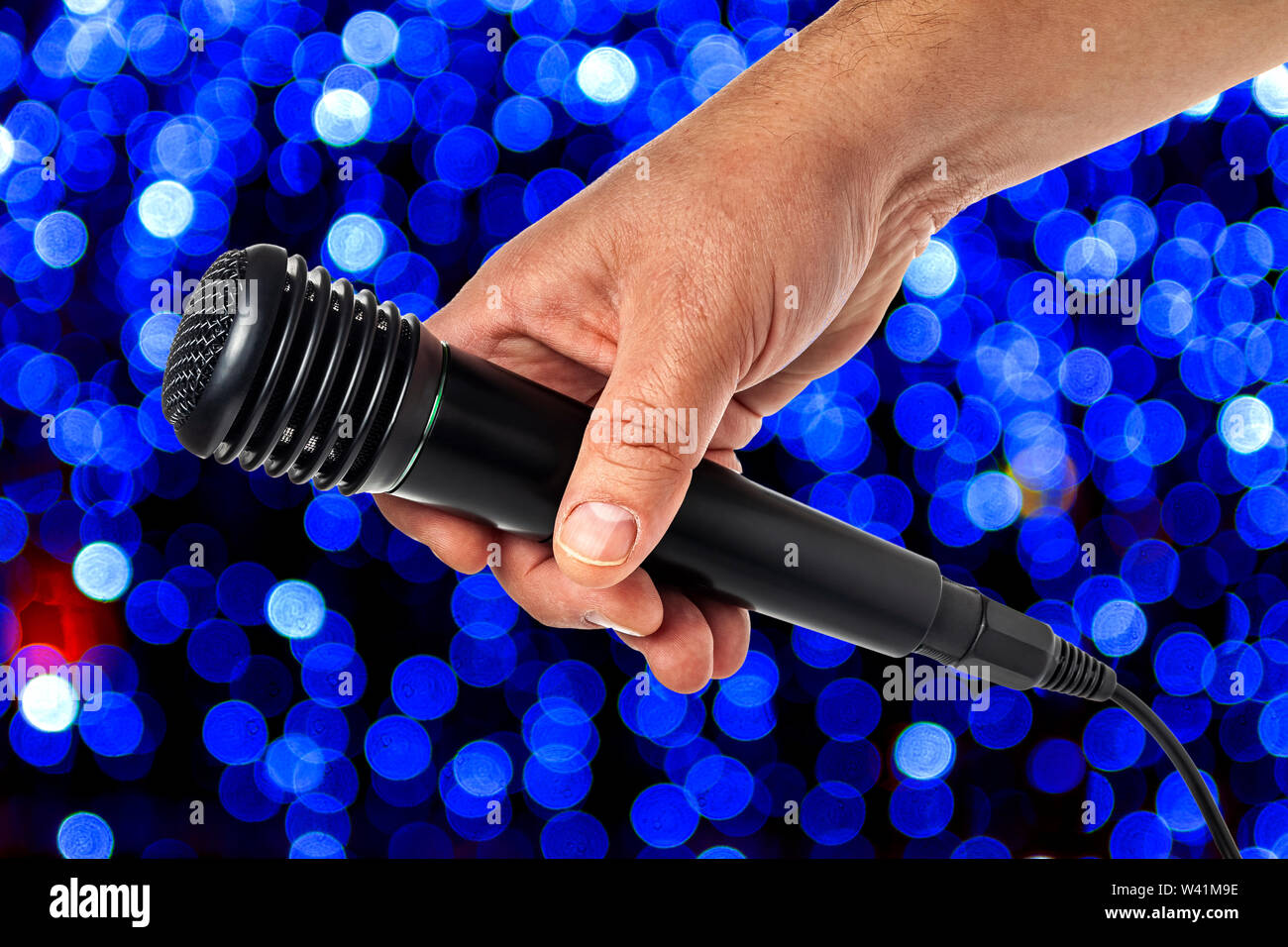 Singer Microphone Hand High Resolution Stock Photography and Images - Alamy
