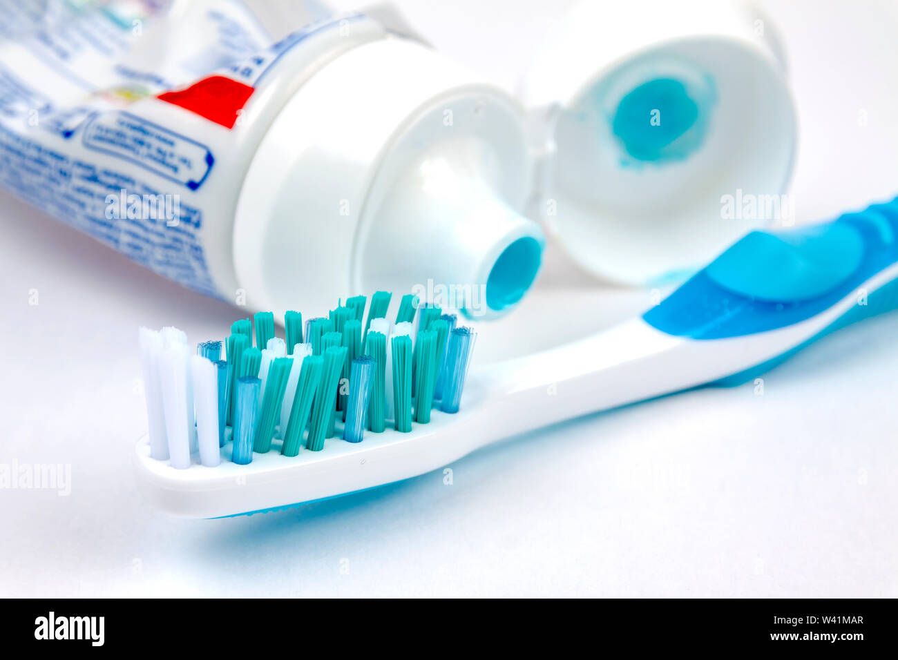 Tooth brush with tooth paste on white background Stock Photo