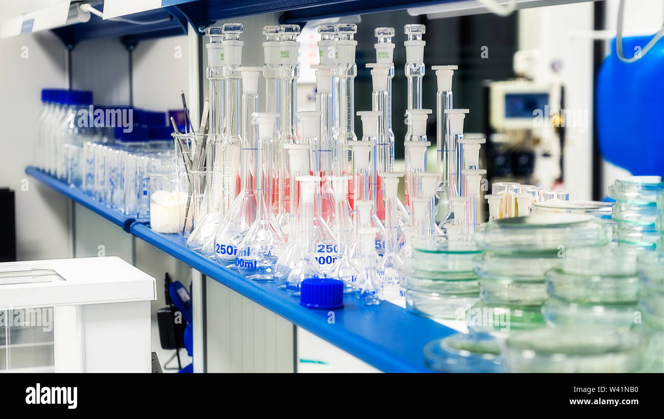 Laboratory glassware on the shelf in the laboratory Stock Photo Alamy