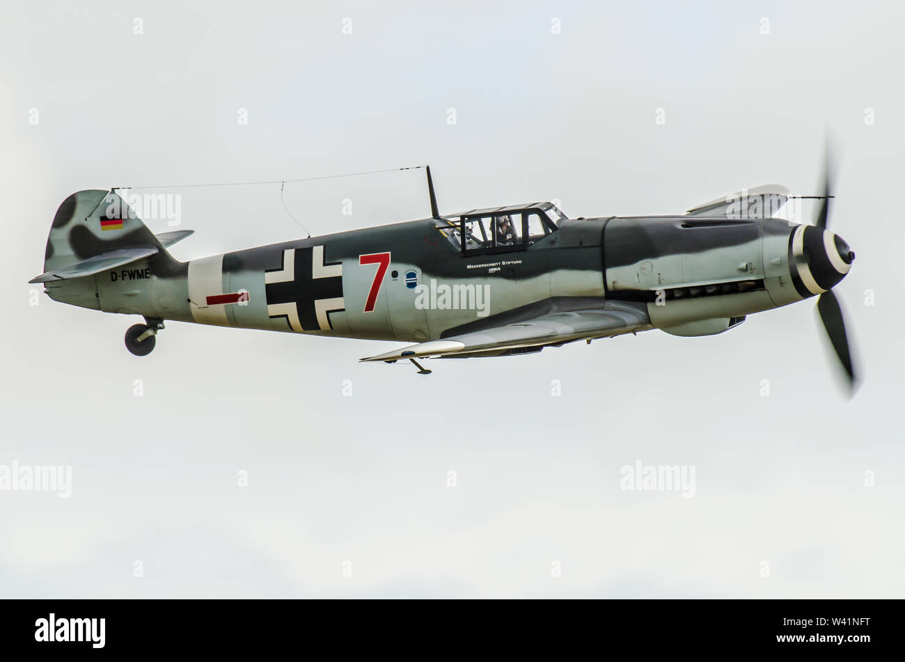 Messerschmitt Bf109 (Buchon) German World War II fighter aircraft. Luftwaffe Second World War Me109 fighter plane flying at an airshow in UK. Red 7 Stock Photo