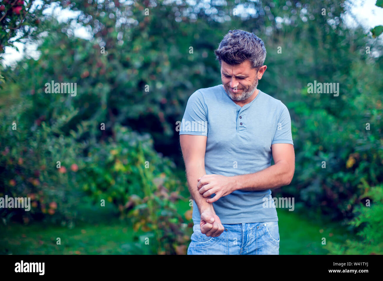 People scratch the itch with hand outdoor, Elbow, itching, Healthcare