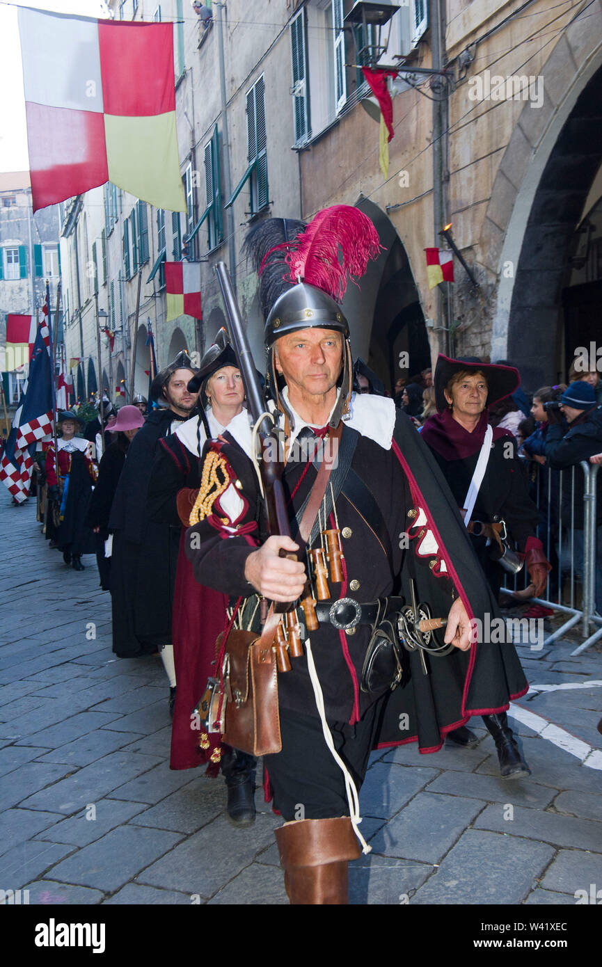 Italy, Liguria, Imperia, Arma di Taggia, historical reenactment 500 figures in costume of the era parade through the historic center. Stock Photo