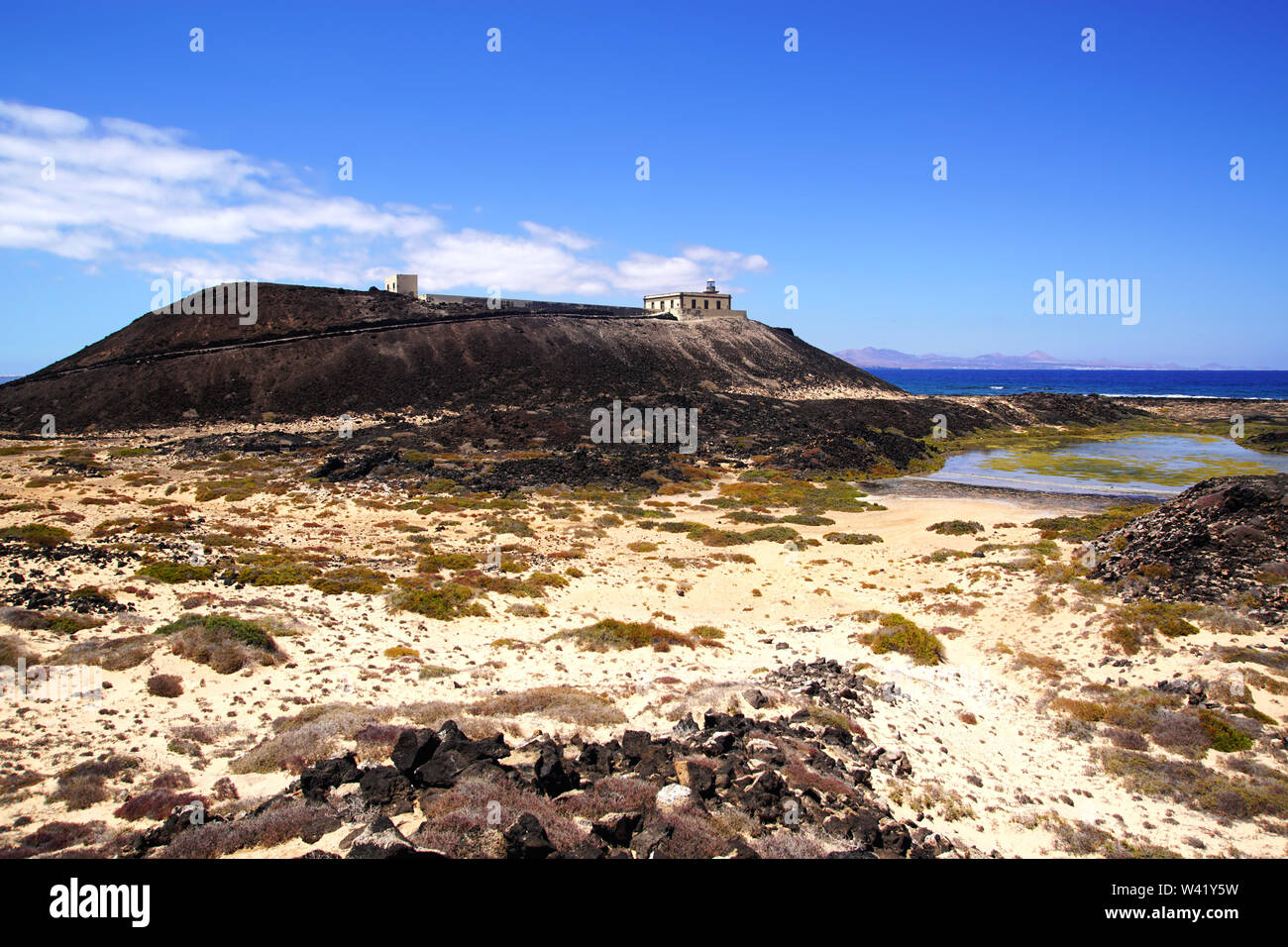 The Punta Martiño Lighthouse on Isla de Lobos in Fuerteventura, Spain Stock Photo