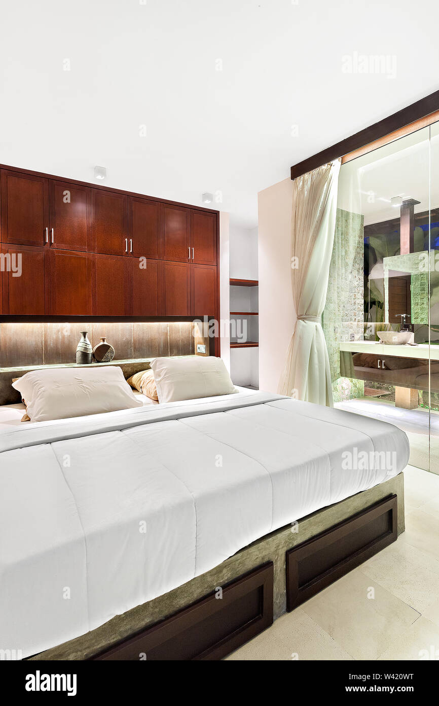Modern Bedroom At Night Illuminated With Flashing Lights