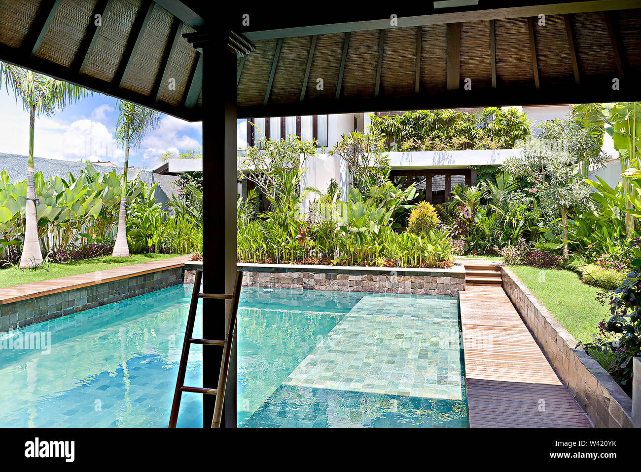 Modern Swimming Pool And The Garden With The View Under The Roof