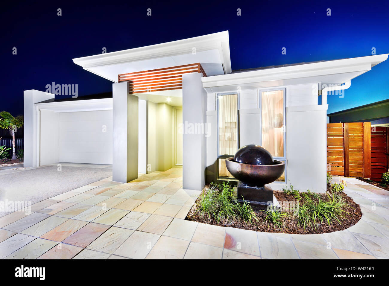 Luxury mansion front side tiles, floor and waterfall pond, which