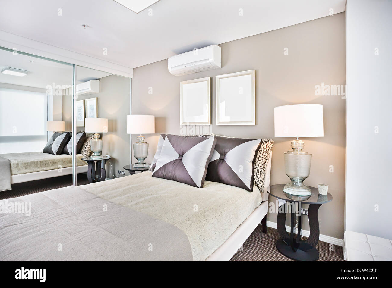 Comfortable Looking Area With Lamps In Bedroom Bed Has Pillows
