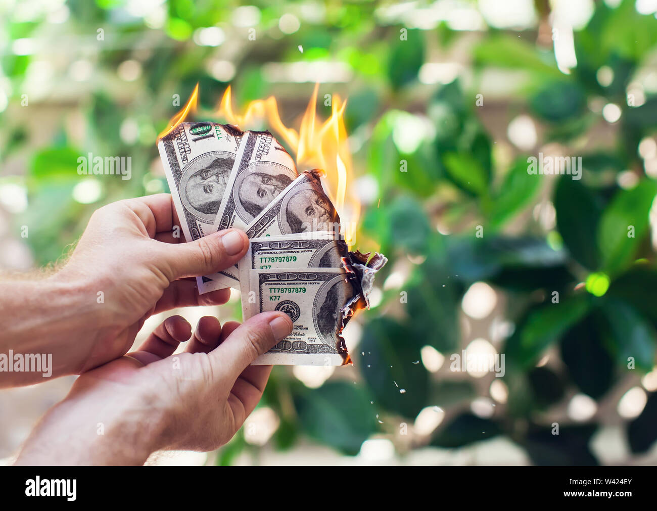 Rich man must burn hires stock photography and images Alamy