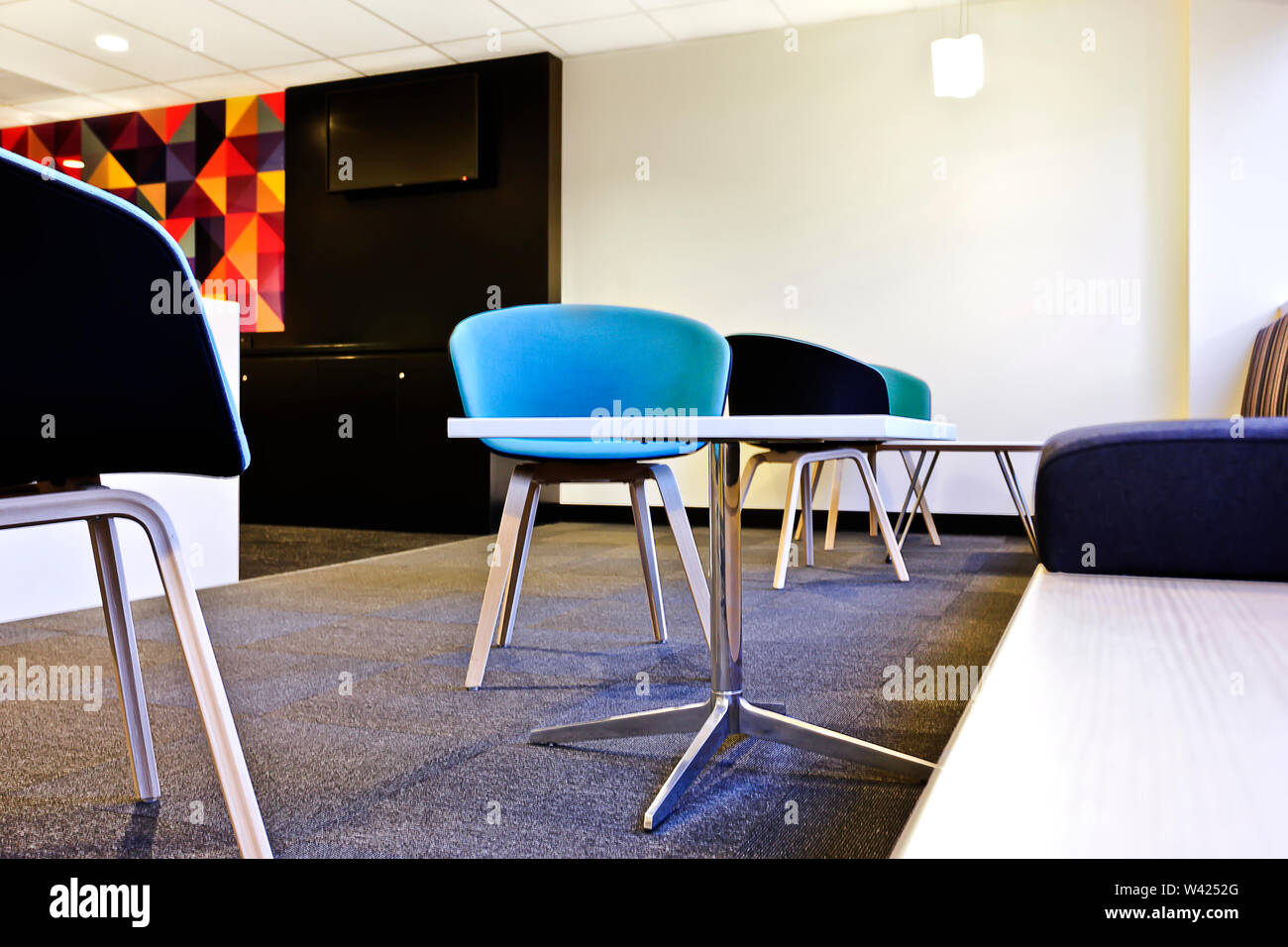 luxury dining room close up focusing chairs and tables on the carpet