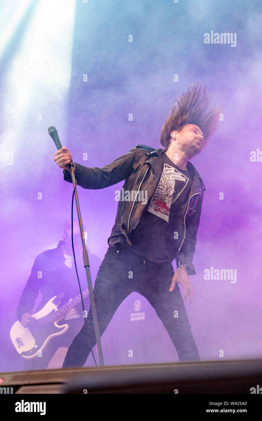 Uskedalen, Norway - June 28th, 2019. The Norwegian black metal and heavy metal band Kvelertak performs a live concert during the Norwegian music festival Festidalen 2019. Here vocalist Ivar Nikolaisen is seen live on stage. (Photo credit: Gonzales Photo - Jarle H. Moe). Stock Photo