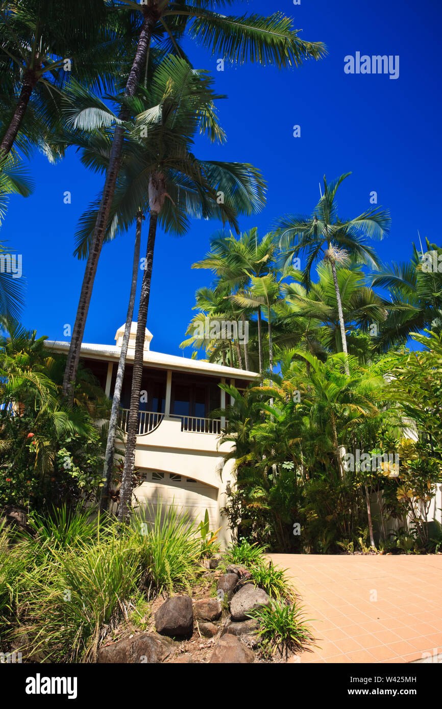 Simple Beach Property A simple beach house with palm trees Stock Photo - Alamy
