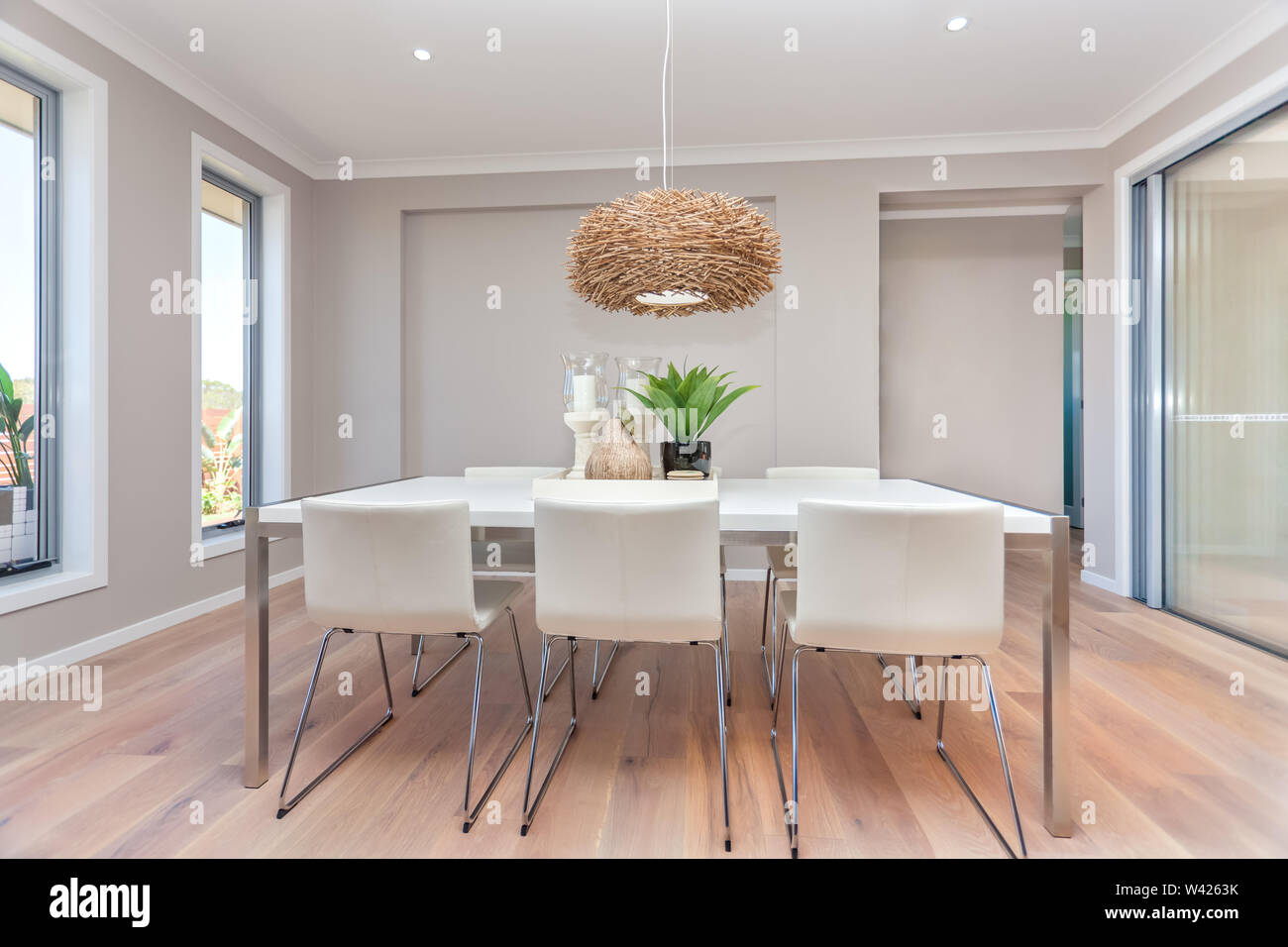 Luxury Dining Room And A Light Color Wooden Floor And Gray Walls