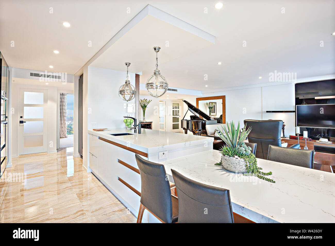A Functional Kitchen And Dining Area Featuring Tiled Floor