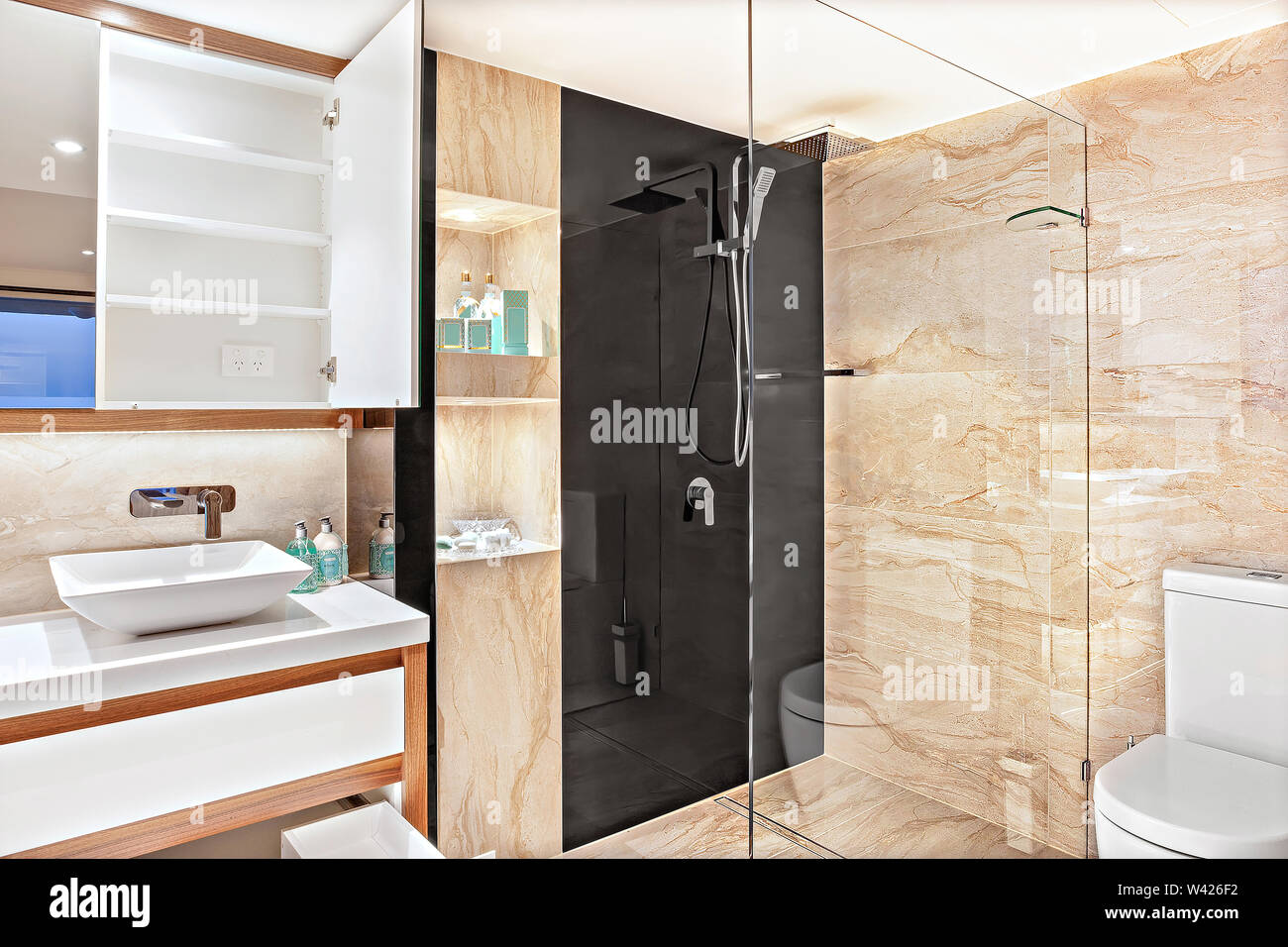 Picture of A glass-separated shower area with contemporary shower heads and wall ...