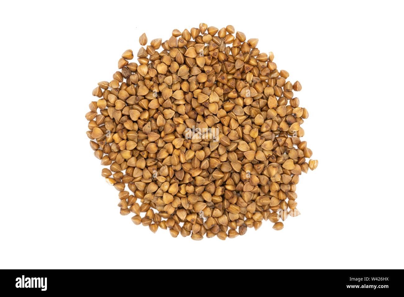 Buckwheat groats, isolated bunch, close up. Gluten free and non