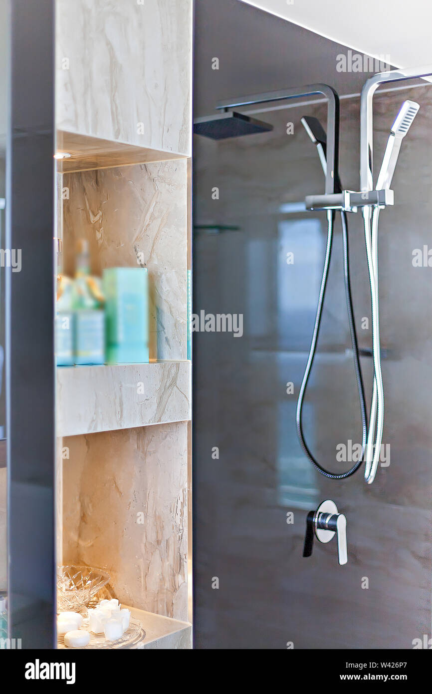 Organized shower shelves bathroom essentials Stock Photo Alamy