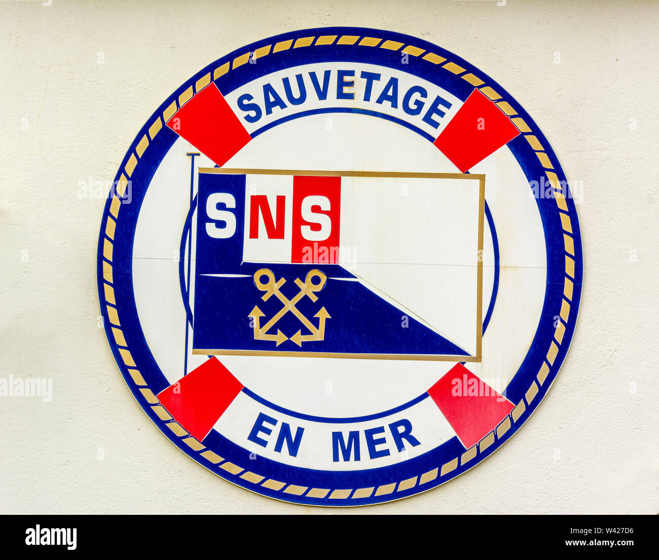 Sign of SNSM, a French voluntary organisation that saves lives at sea, Ploumanach,  Cotes-d'Armor department, Bretagne, France Stock Photo