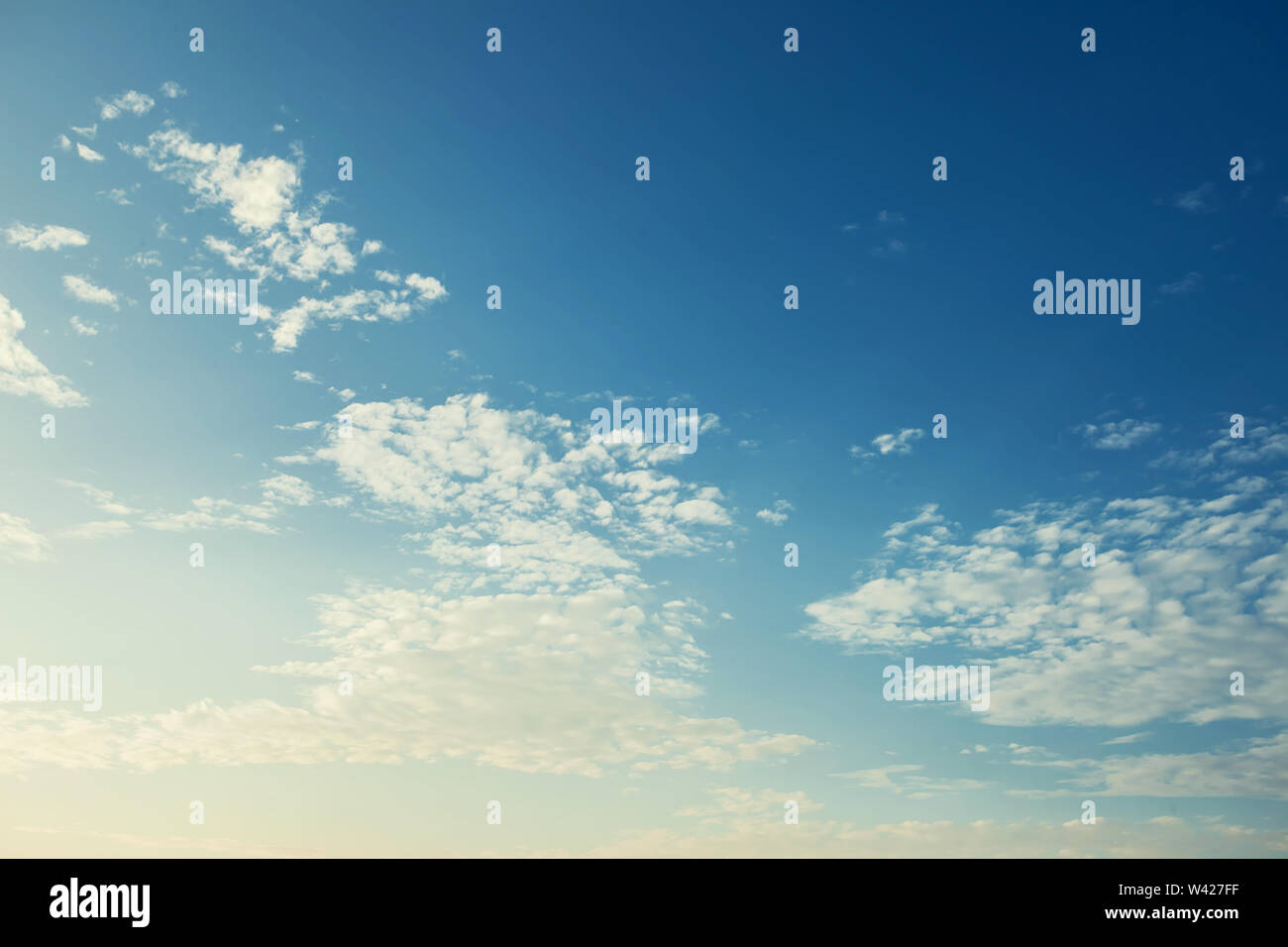 Blue sky background with white clouds sunny day Stock Photo - Alamy