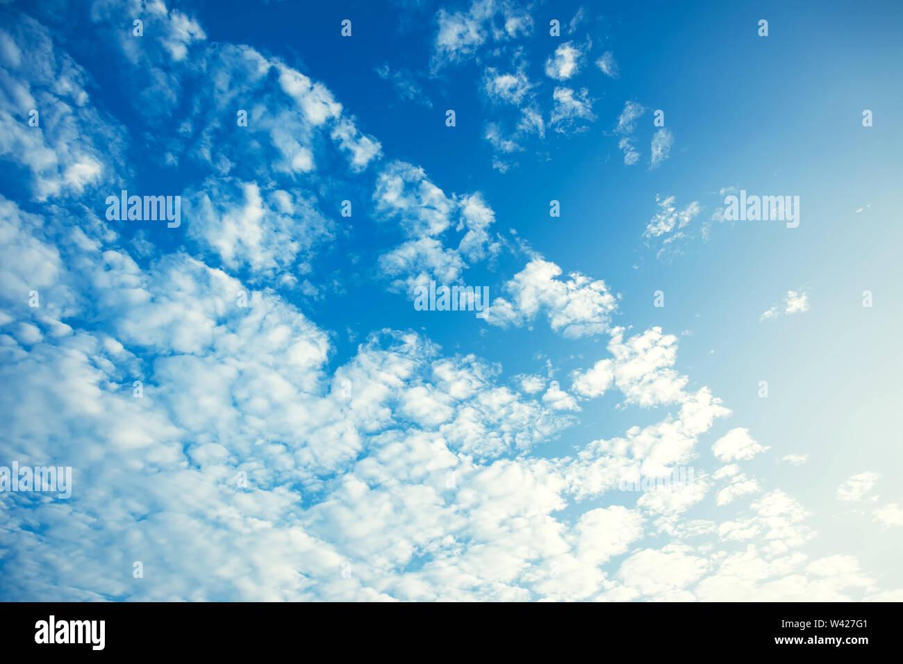 Blue sky background with white clouds sunny day Stock Photo - Alamy