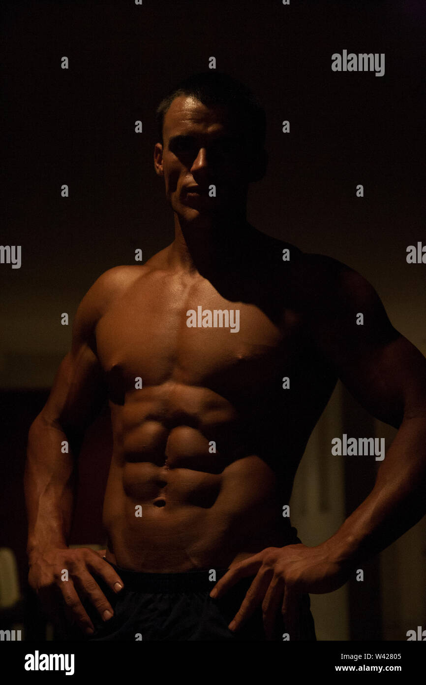 Man thinking and ready for exercise night time scene at inside