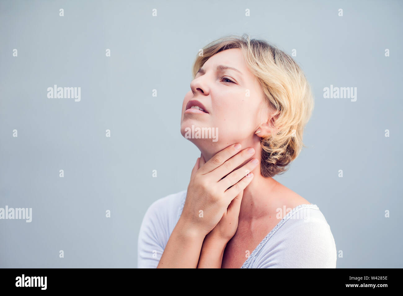 Throat Pain. Closeup Of Sick Woman With Sore Throat Feeling Bad, Suffering From Painful