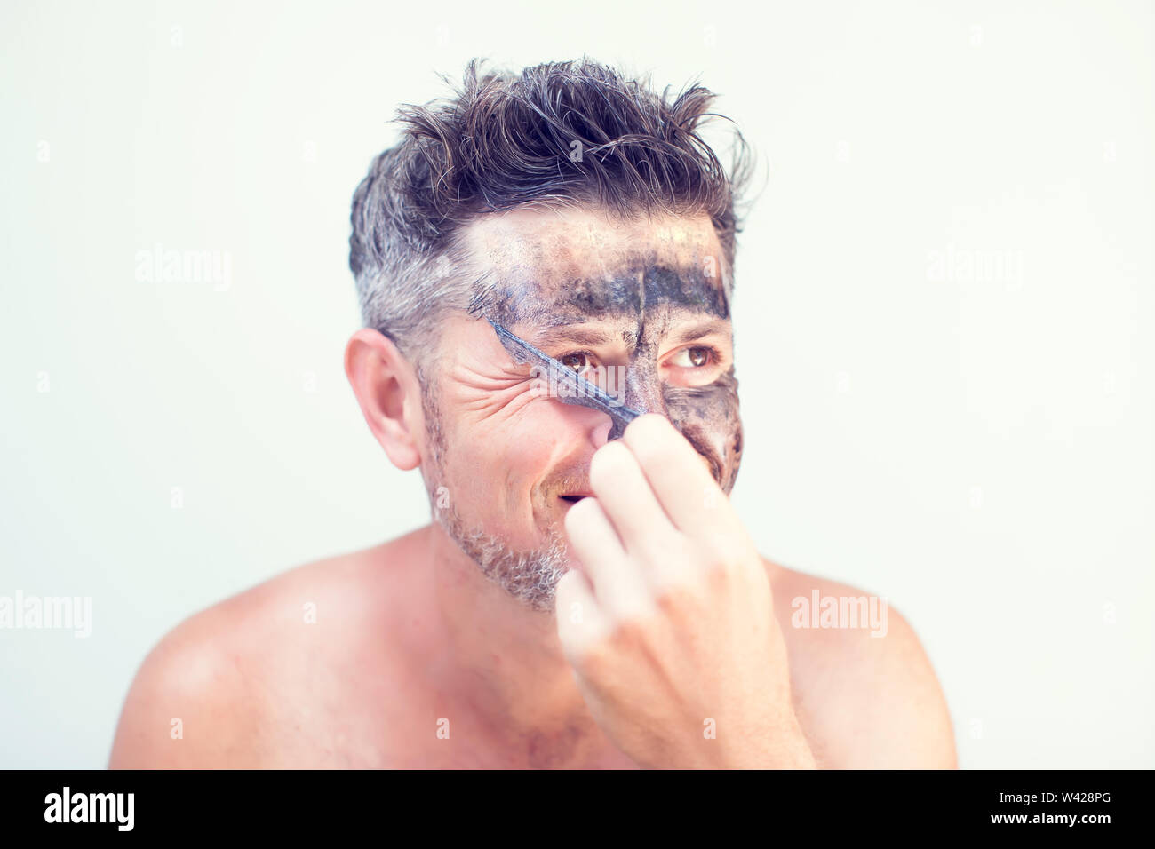 Download Black Face Charcoal Mask Man High Resolution Stock Photography And Images Alamy PSD Mockup Templates