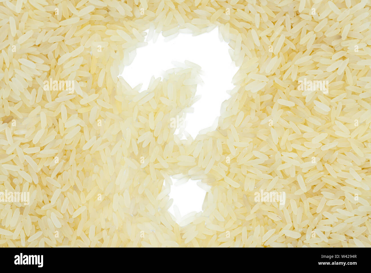 White Rice Signs White rice steamed, question mark shape, close up. Healthy nutrition ...