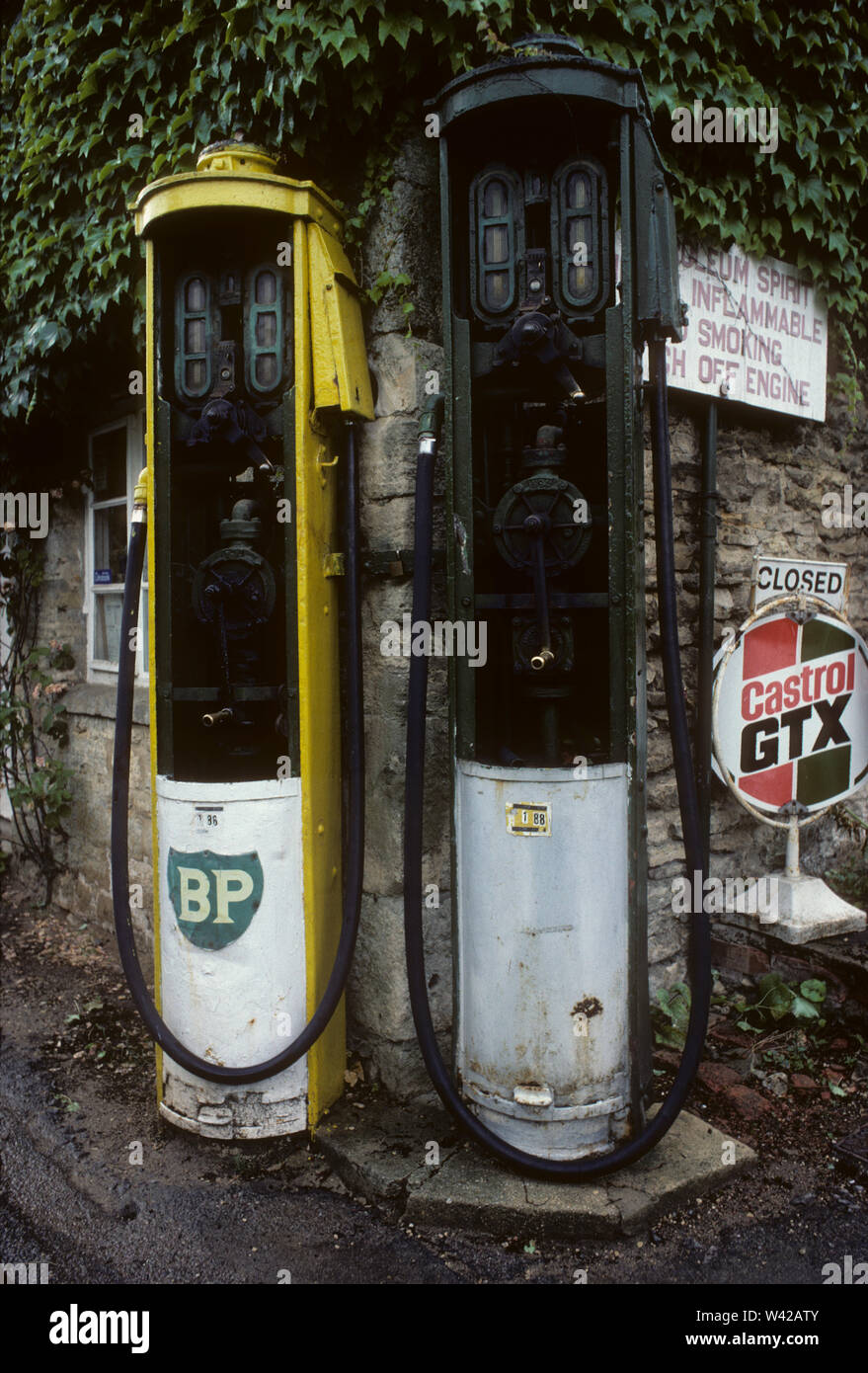 Old petrol pumps in Withington, Glos, 1983 Stock Photo