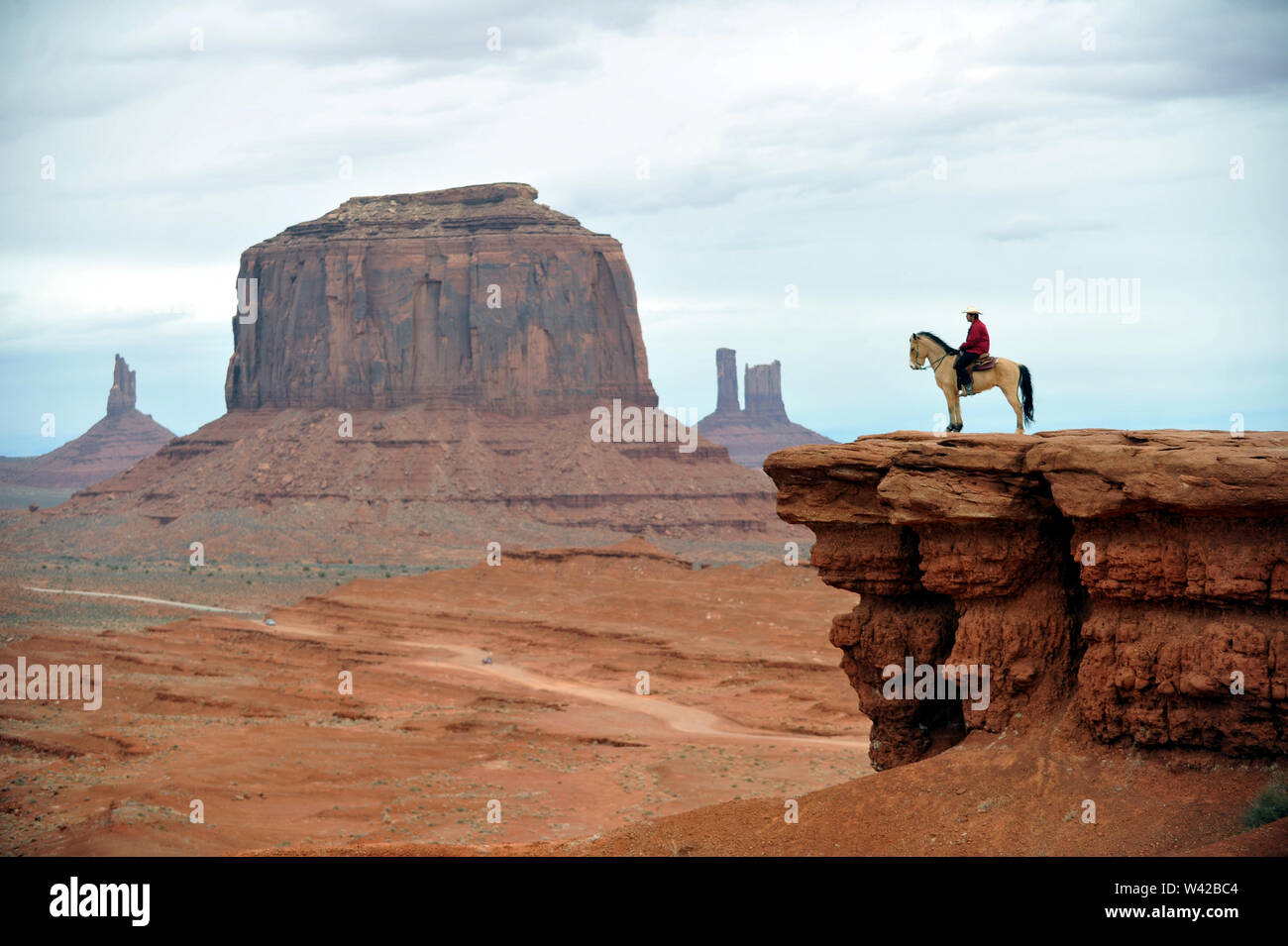 Monument Valley in the Navajo Nation Reservation on the Utah and Arizona border is the perfect setting for the wild west and cowboy films Stock Photo