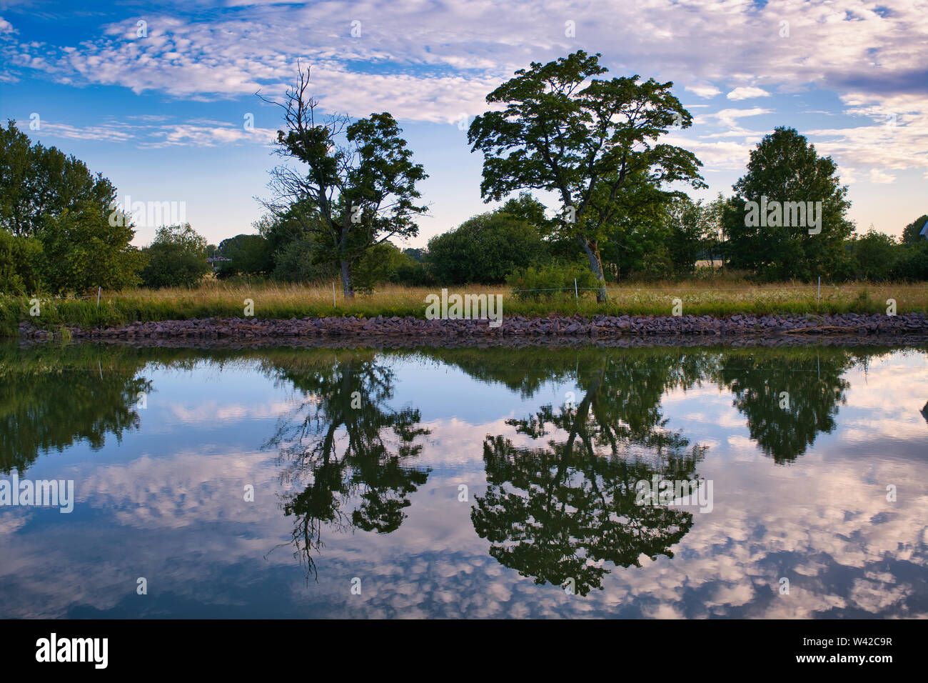 Clouds reflect on water hi-res stock photography and images - Alamy