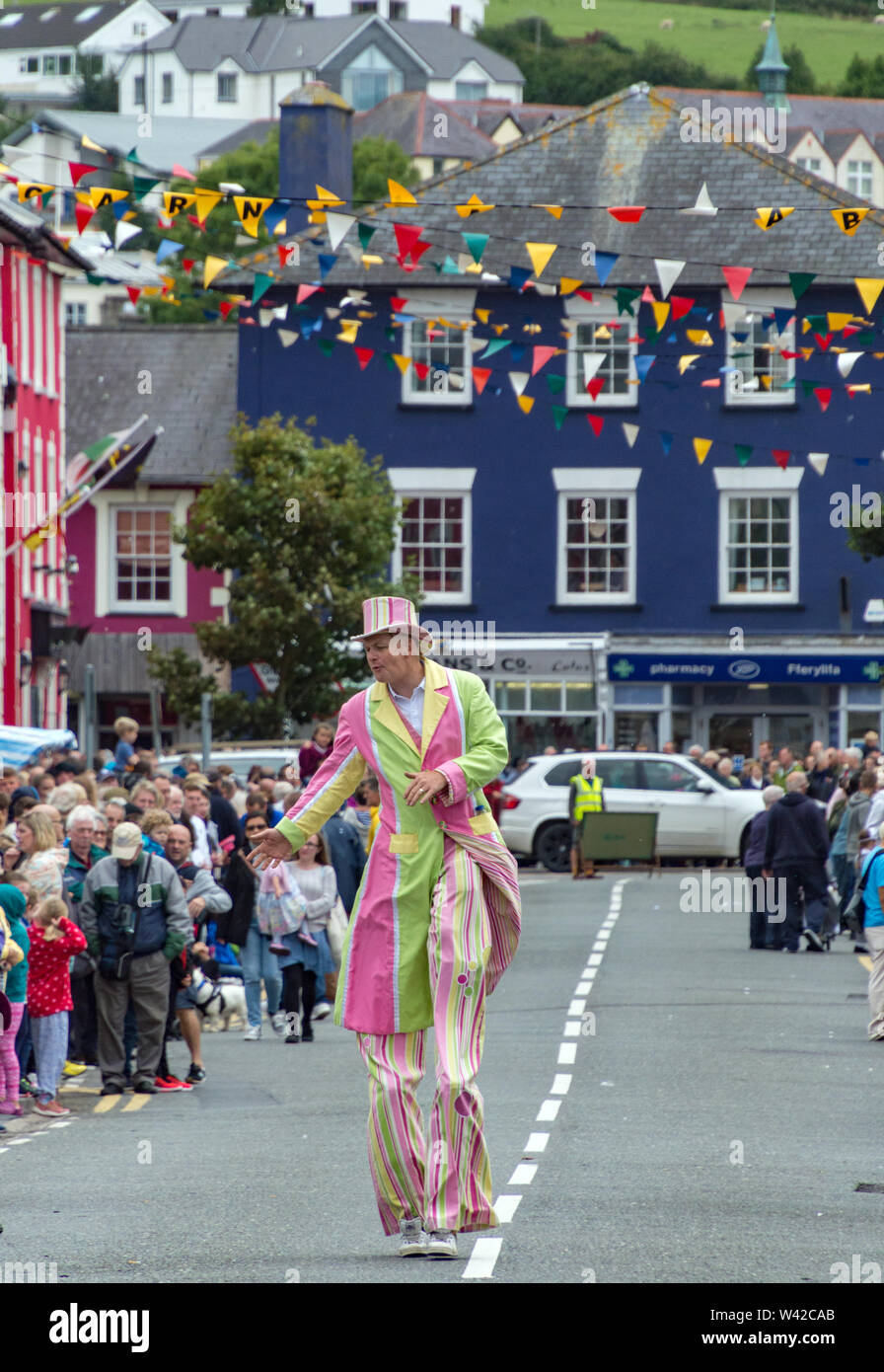 Stilt walker at the Aberaeron Carnival, Ceredigion, Wales Stock Photo