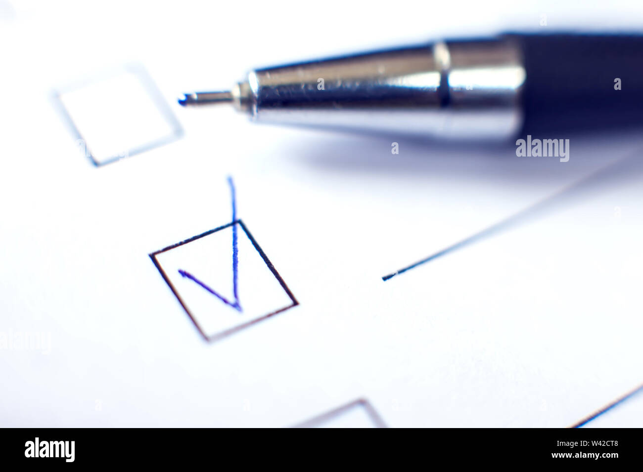 Pen Checkboxes Checklist with a pen on white paper. Checkbox concept Stock Photo - Alamy