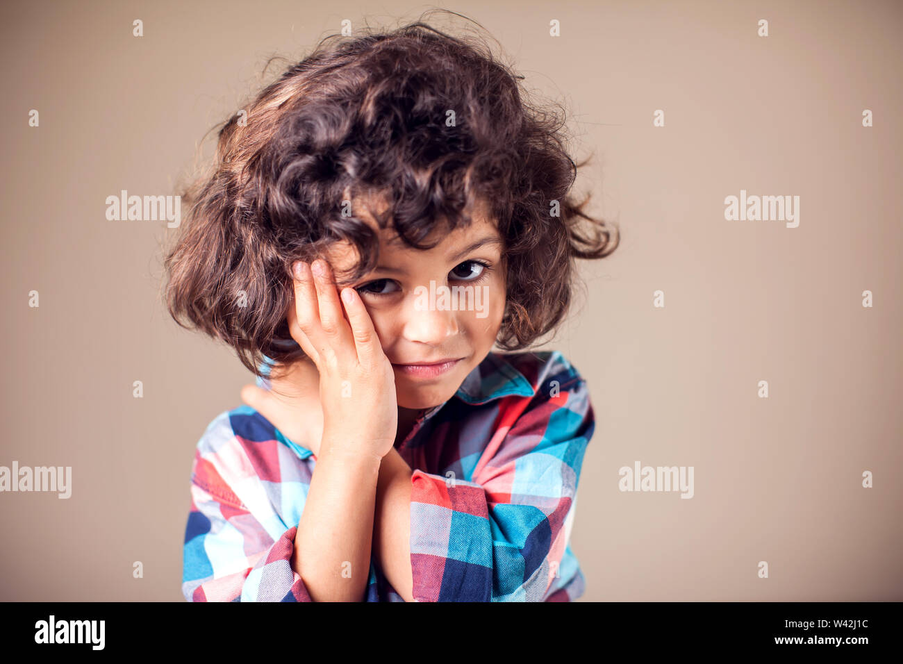Child toothache. Closeup portrait boy with sensitive tooth ache. Negative human emotion, medicine, healthcare concept Stock Photo