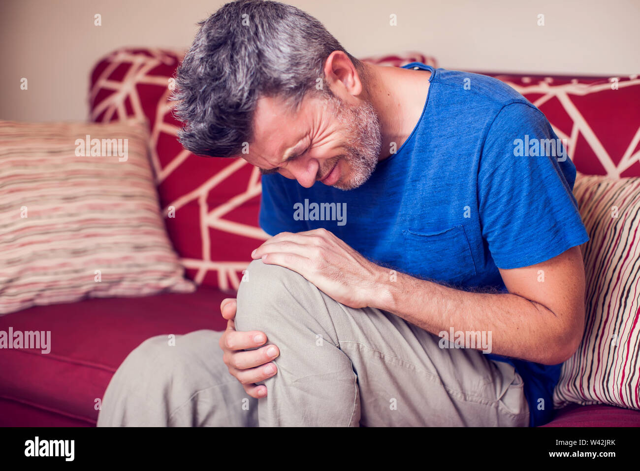 Standing leg pain home hi-res stock photography and images - Alamy