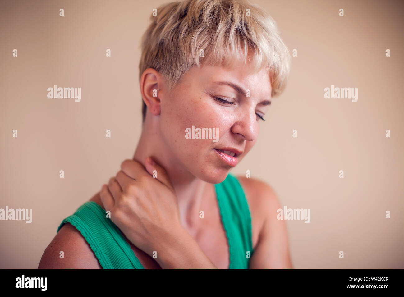 Woman With Short Hair Feels Strong Neck Pain Isolated People