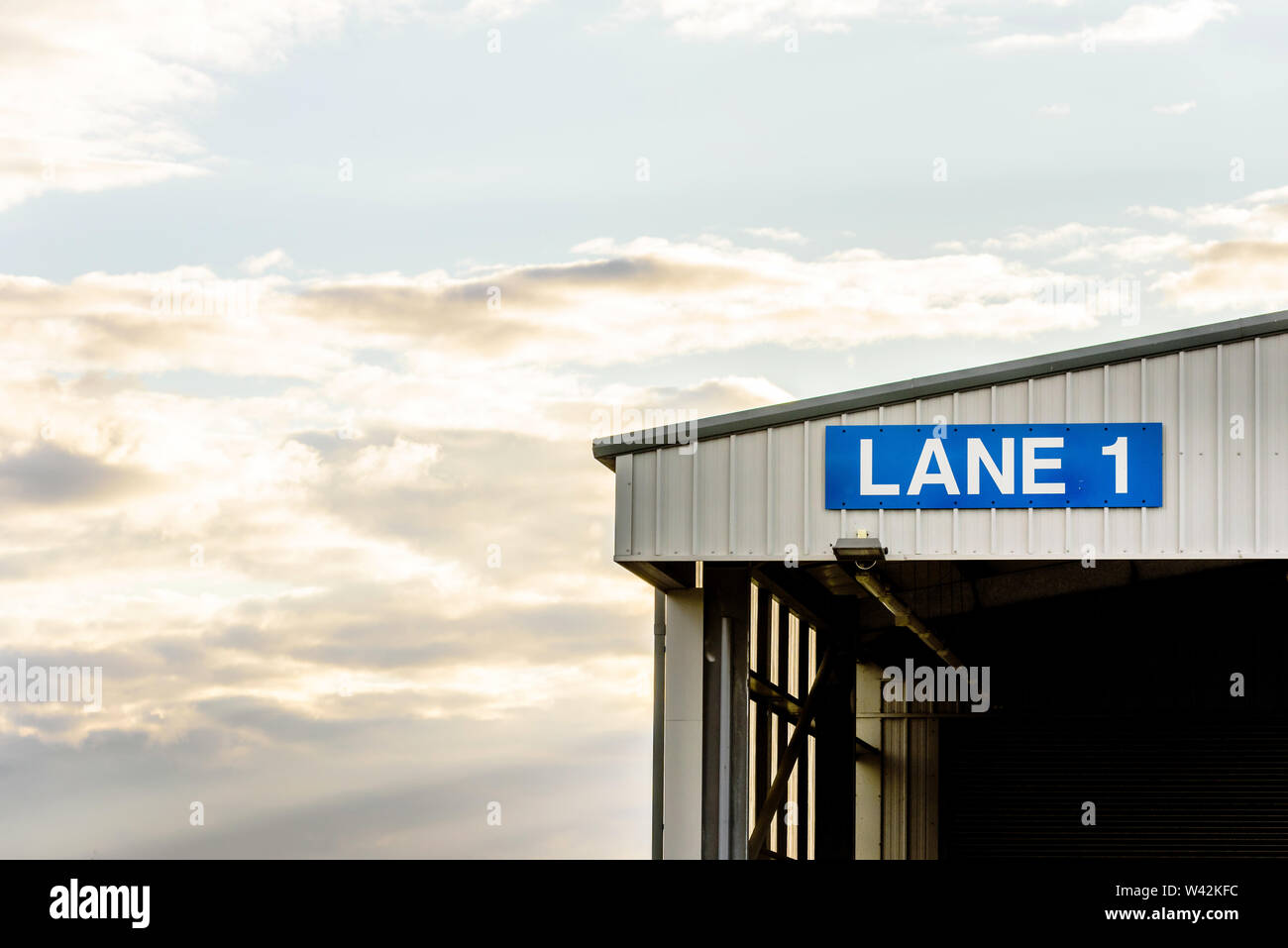 transport test station sign with text lane one in uk Stock Photo - Alamy