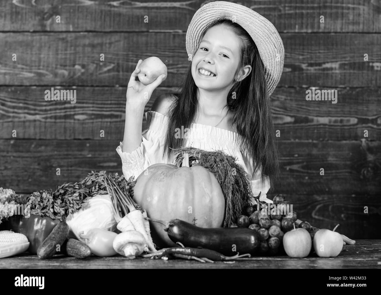 Farm activities for kids. Girl kid farm market with fall harvest. Child
