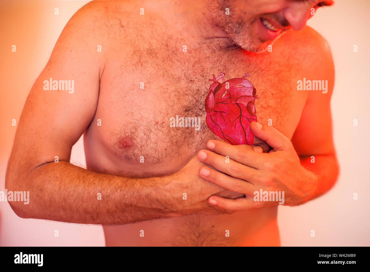 Man has a strong heart attack. People, healthcare and medicine concept Stock Photo