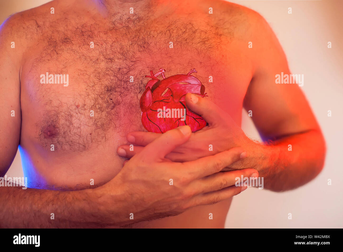 Man has a strong heart attack. People, healthcare and medicine concept Stock Photo