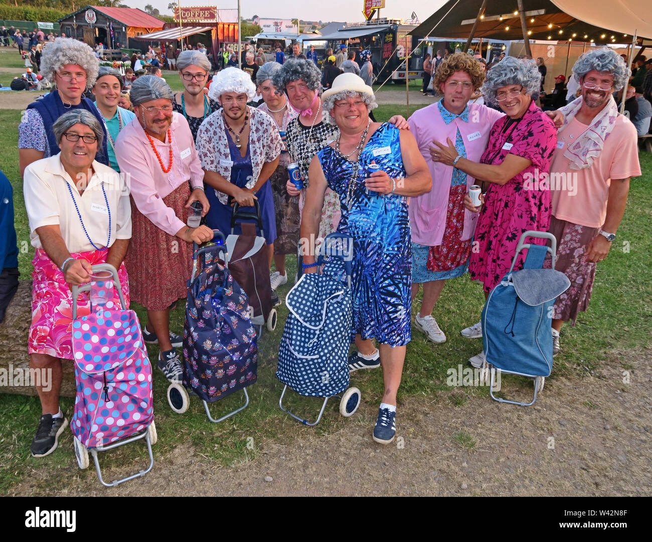 Party of Formula One fans, dressed as old ladies, Mrs Doubtfire, at Silverstone Woodlands, F1 GP 2019, Towcester, Great Britain, UK Stock Photo