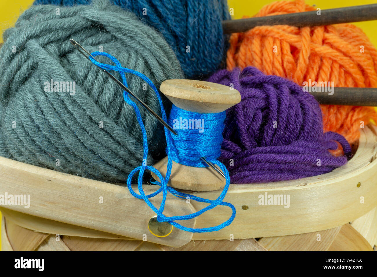 Wool Clews With Knitting Needles Woolen Roll Balls Skein Threads Stock  Photo, Picture and Royalty Free Image. Image 40010256.