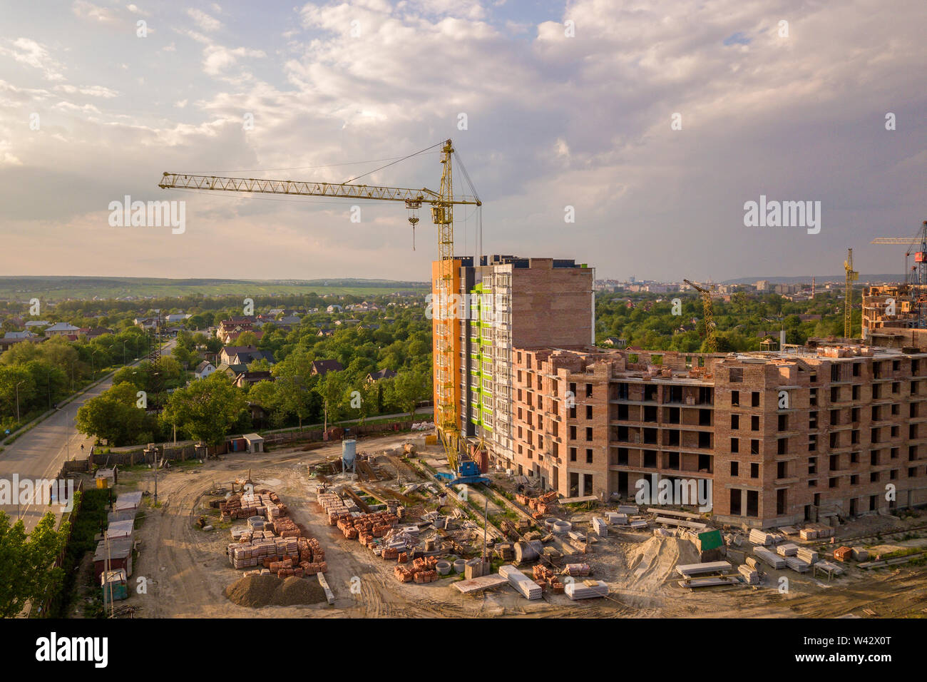Aerial view of building site. Apartment or office building under ...