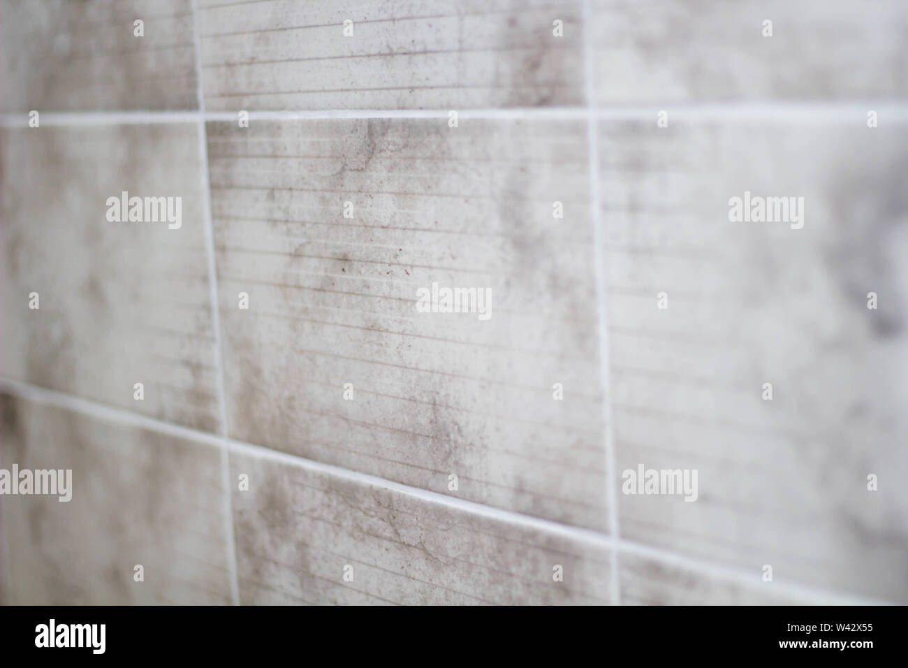 Gray tiles in the kitchen close up. Stock Photo